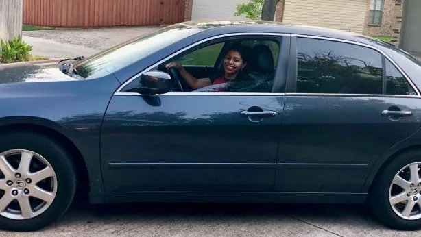 Celeste with her car